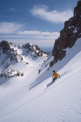 thrilling snowboarding adventure unfolds against backdrop of majestic snowcapped mountains