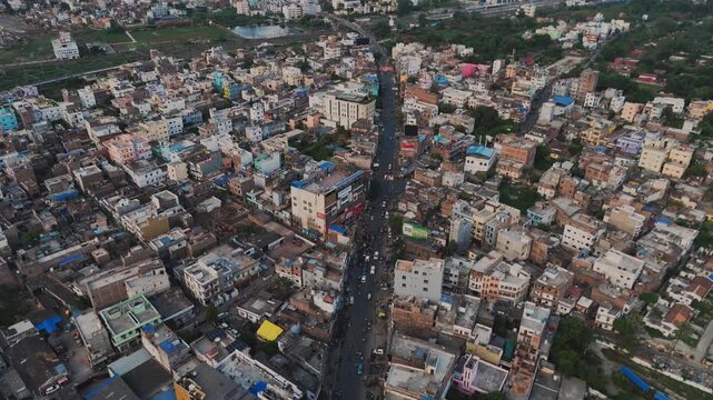 Top down cross traffic highway with cars, trucks aerial. Urban transportation at bridge road at Delhi. Cinematic cityscape of  freeway drone shot. Noida Freeway.