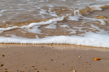 frozen waves on the beach in winter