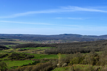 Obraz premium Scenic view of Palencia mountains with snowy peaks and green valleys