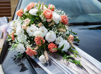 Flower bouqet for a wedding on a car