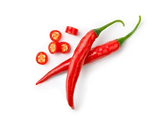Küchenrückwand glas motiv Scharfe Chili-pfeffer Flat lay of Two Red chili peppers with sliced isolated on white.  © Ying