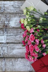 Bouquet of flowers,christmas on wooden background,top view, free space