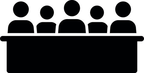 Diverse group sitting at conference table