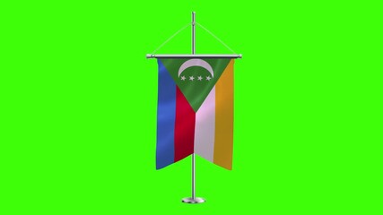 3D Comoros flag waving in the wind. Realistic pole flag of Comoros on a green screen, Slow motion perfect loop, 4k video, 3d render, national event, independence day, fabric texture, HD video.