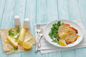 grilled chicken breast topped with melted cheese