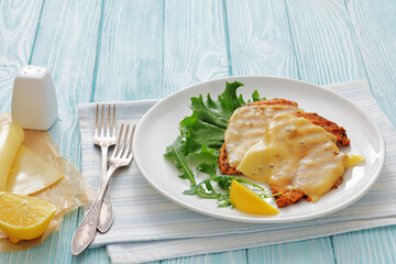 grilled chicken breast topped with melted cheese