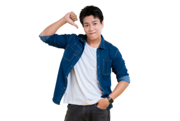 A young man with his thumb down, expressing a negative emotion. The man is wearing a blue denim shirt, looking directly at the camera