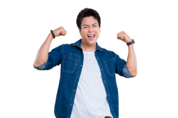 A confident man celebrating victory and triumph while raising his arms, with a happy facial expression