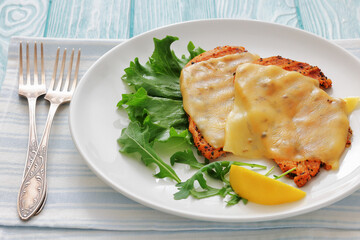 grilled chicken breast topped with melted cheese