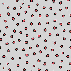 classic black and orange polka dot seamless pattern on light grey background for elegant fashion textile, wrapping and surface design