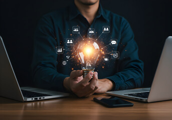 Person holding a glowing lightbulb with innovation icons, symbolizing creative ideas, problem-solving, and technology.