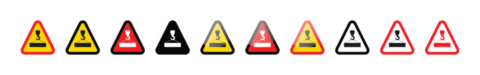 A row of crane load warning signs in various colors and outline styles on white