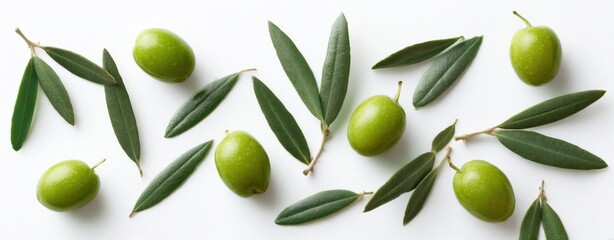 Obraz premium The abundance of fresh green olives and leaves on a bright background.