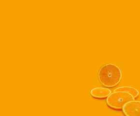 orange slices on an orange background
