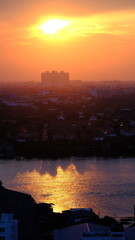 Fototapeta premium Aerial view of chao phraya river with landmark of Thailand, Sunset Atmosphere Along