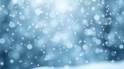 Fototapeta premium Gentle snowfall on a soft focus blue background with a glowing bokeh effect. A peaceful winter wonderland concept.