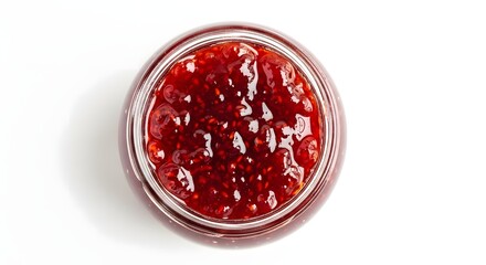 A top view of a glass jar filled with homemade raspberry jam on a clean white background surface view