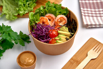 Colorful and Healthy Salad Bowl with Shrimp, Fresh Vegetables, and Nutritious Ingredients for a Delicious and Wholesome Meal Option