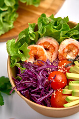 A Colorful Bowl of Fresh Ingredients Showcasing Shrimp Rolls, Vibrant Vegetables, and Crisp Greens, Perfect for a Healthy and Nutritious Meal Experience