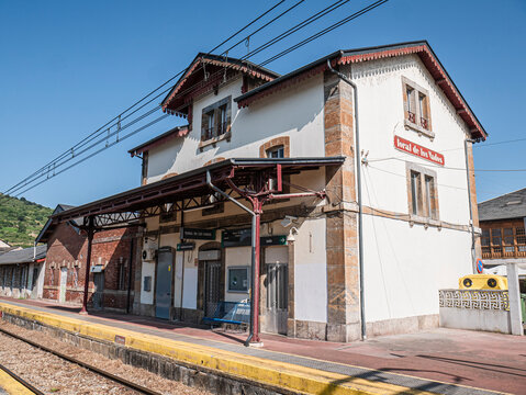 Toral de los Vados, Leon, Spain, 06-16-2025: The passenger building at Toral de los Vados station is completely empty in the morning, next to the platform and a platform located outside