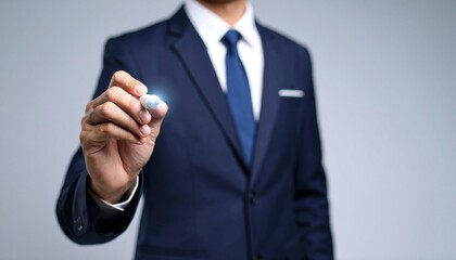 Fototapeta premium Business wallpaper of a man in a suit holding a pen and pointing somewhere