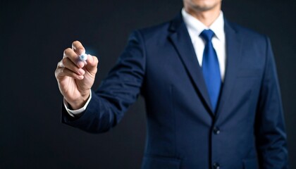 Business wallpaper of a man in a suit holding a pen and pointing somewhere