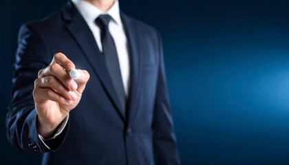 Fototapeta premium Business wallpaper of a man in a suit holding a pen and pointing somewhere