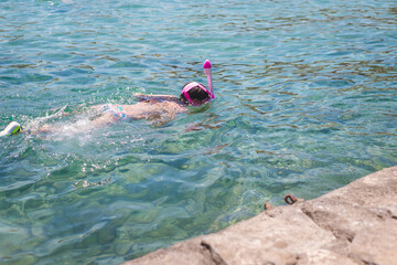 diving in the sea with a mask. Selective focus.