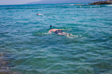 diving in the sea with a mask. Selective focus.