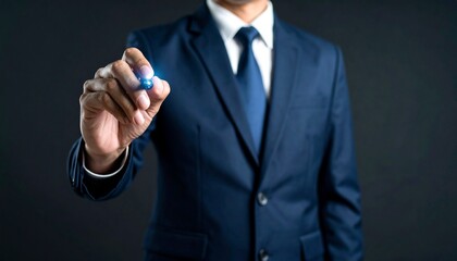 Fototapeta premium Business wallpaper of a man in a suit holding a pen and pointing somewhere