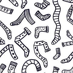 Vector seamless pattern of different socks collection, hand drawn in doodle style