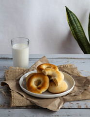 Colombian pandebono freshly baked on rustic background
