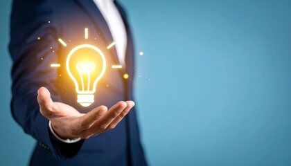 3D scene with a lightbulb-shaped idea icon floating above the hand of a blurred man in a suit