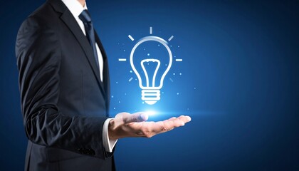 3D scene with a lightbulb-shaped idea icon floating above the hand of a blurred man in a suit