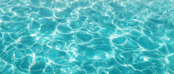 Obraz premium The tranquil blue surface of shimmering water inviting relaxation and peace.