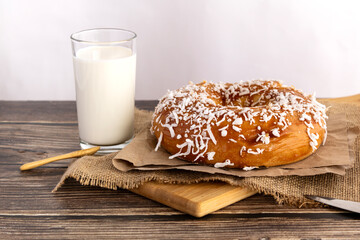 Traditional breakfast with sweet pastry and warm drink
