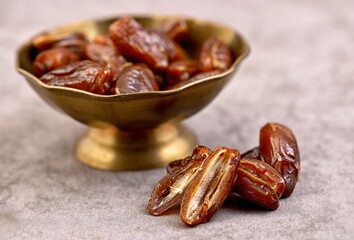 Dates in bowl, still life.