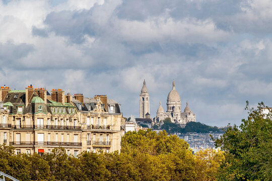 The Basilica of the Sacred Heart seen from the Pont d'Iéna bridge, Paris, France - Powered by Adobe