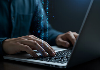Hands typing on a laptop with glowing binary code streaming upwards, symbolizing data processing and digital communication.