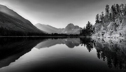 a serene monochrome landscape of mountains reflected in a calm lake