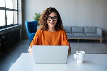 Woman working on laptop at home office remote work online meeting video call concept