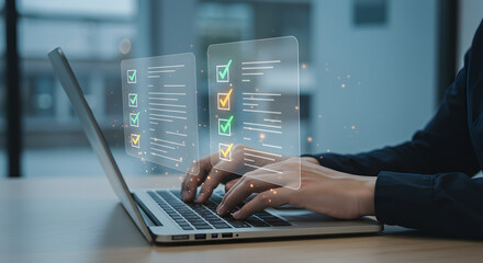  Person on laptop completing online checklist. Represents survey, task management, successful completion, and digital form submission.