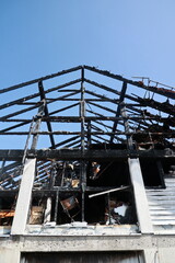 A building with a black roof and a black interior