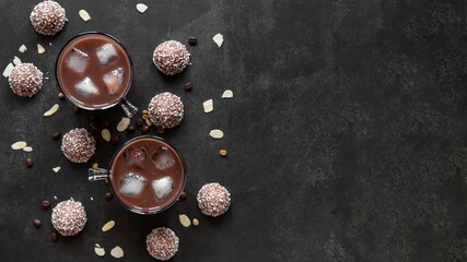 chocolate cocoa and various chocolatey dessert with black background 