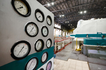 Monitoring equipment at a large industrial facility during daytime operations in an engineering...