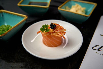 A Delightful Gourmet Dish Featuring Vibrant Salmon, Garnished with Fresh Herbs, Caviar, and Accompanied by Colorful Sides Ready to Indulge in a Unique Culinary Experience