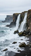 Fototapeta premium Waterfalls cascading over cliffs into the ocean, with waves crashing on a black sand beach.