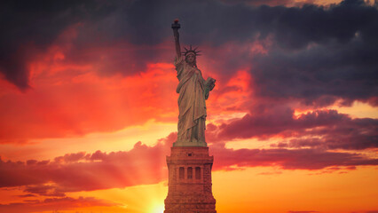Statue of Liberty against a epic sunset. United States of America