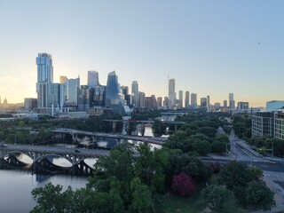 Fototapeta premium Beautiful Austin skyline downtown at sunrise with a stunning aerial drone view